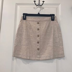 Cream/tan skirt with fake button detailing